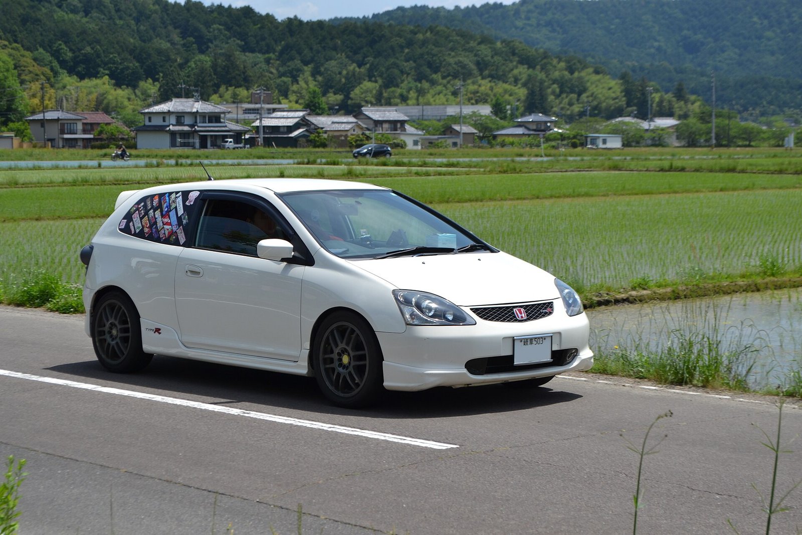 JDM Honda Civic Type R EP3 in Championship White driving in Japan