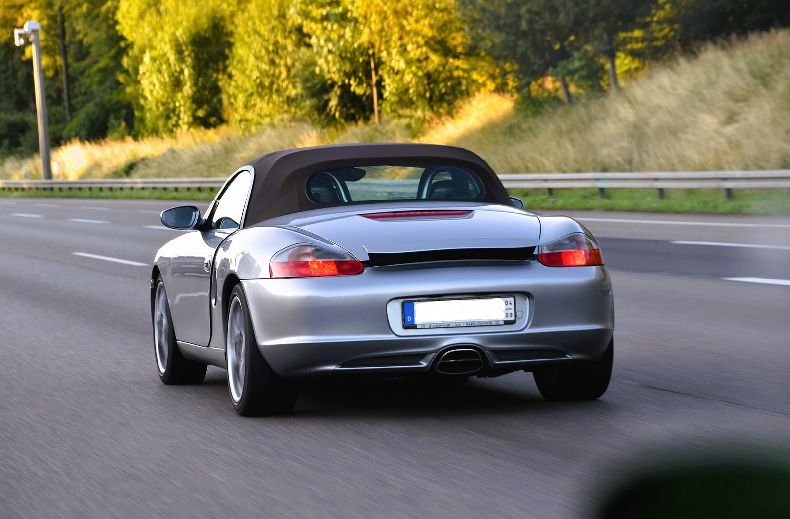2003 facelift Porsche Boxster 986 with clear indicators and glass rear window
